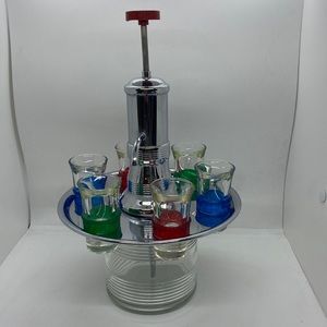 Park Sherman MCM liquor dispenser with six shot glasses.